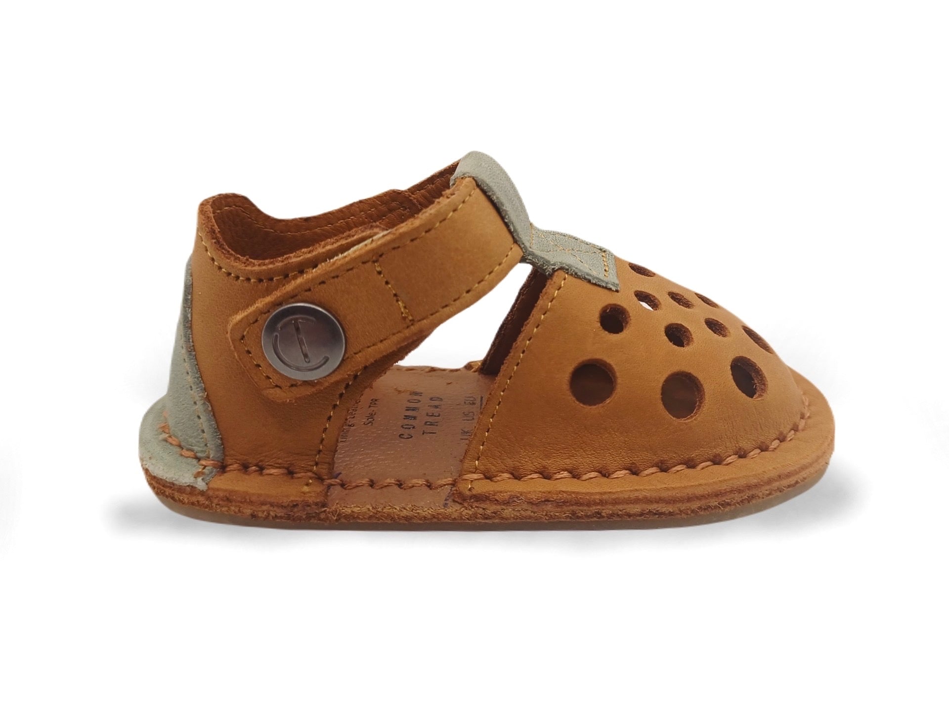 Side view of kids leather barefoot sandal showing zero drop design
