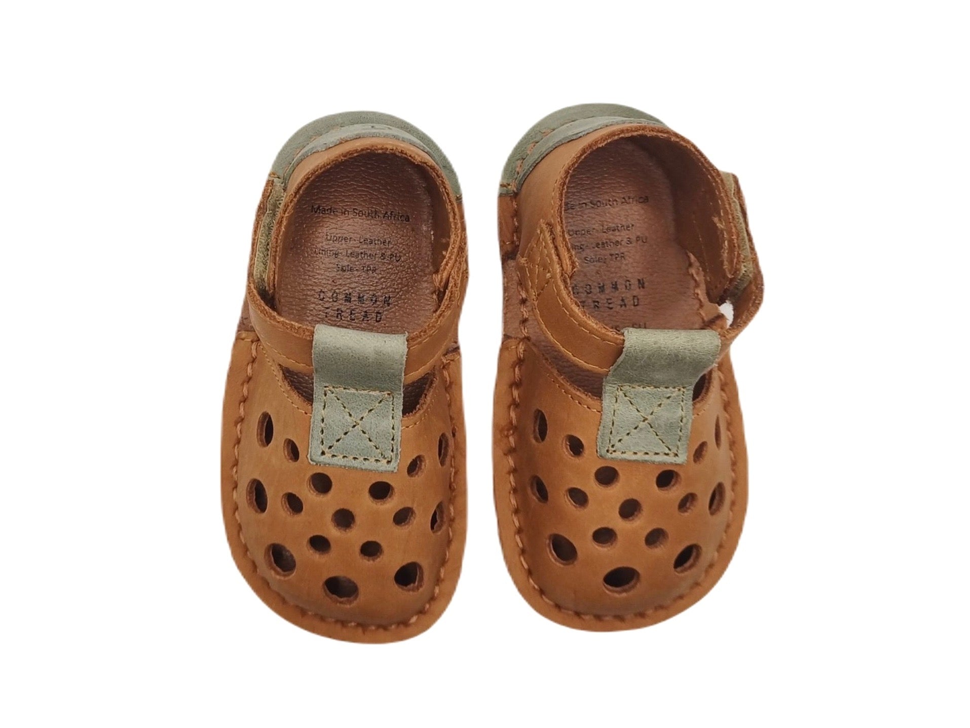 Top view of kids barefoot sandals pair in leather