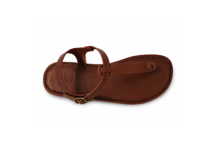 Top view of the Sierra women’s barefoot leather sandal by Common Tread showing foot-shaped design and adjustable ankle strap