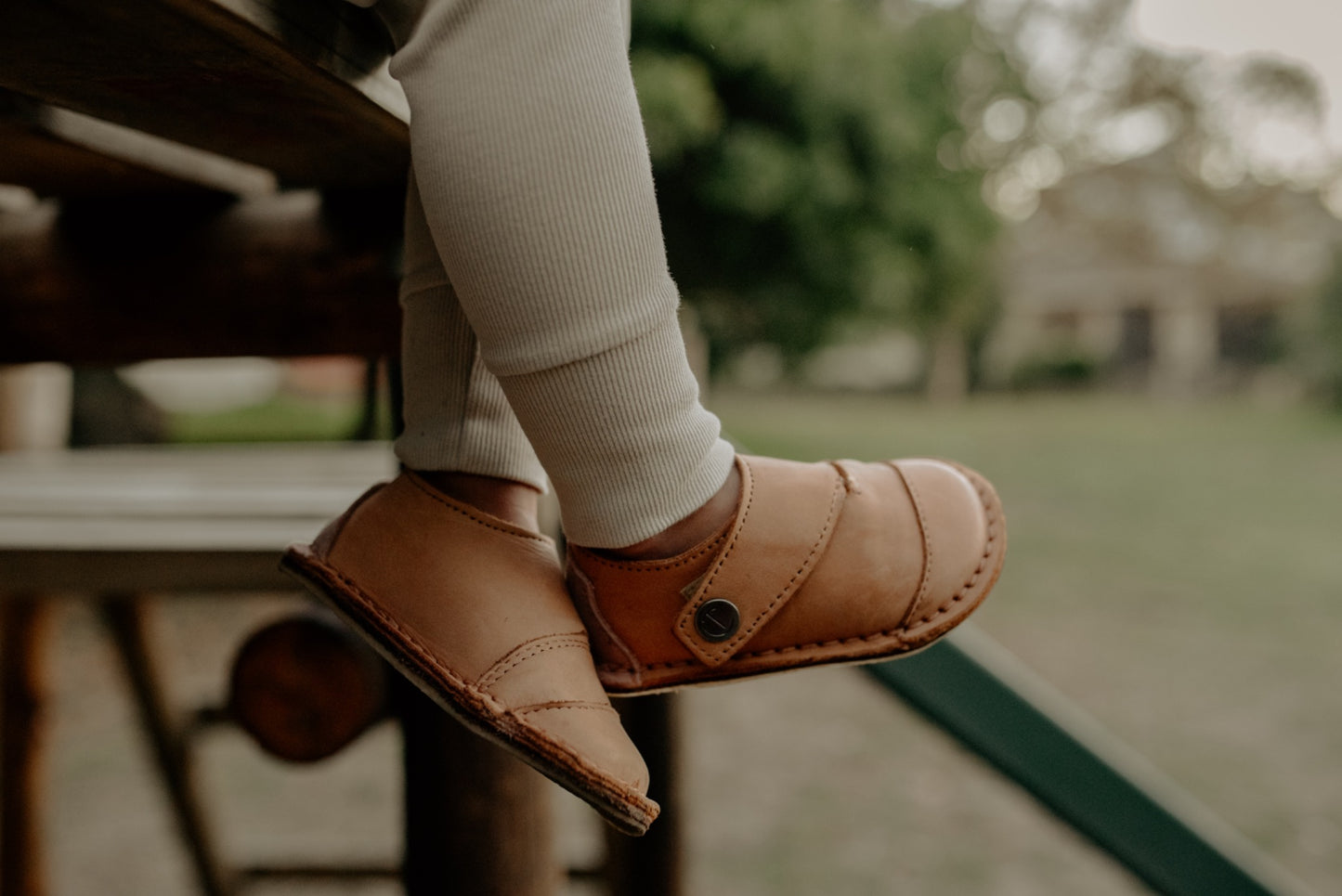 Close-up of Common Tread Evergreen shoes showing wide toe box and soft leather